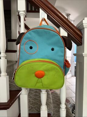 Skip Hop Aqua and Lime Puppy Backpack with Orange Accents
